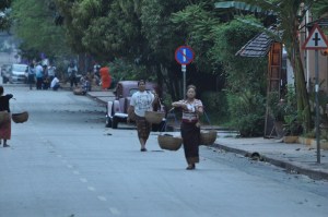 Woman with baskets Luang Prabang